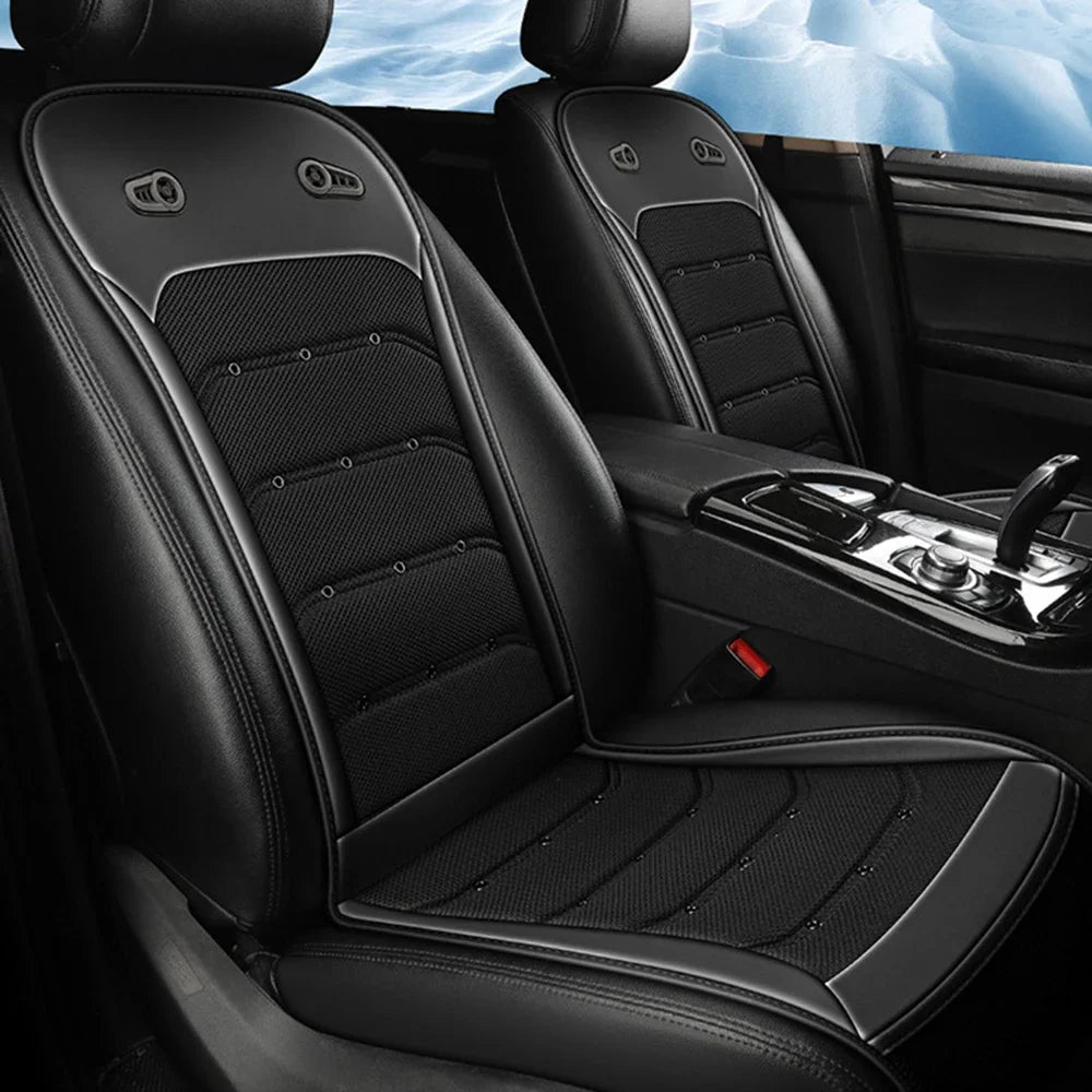 Black car seat covers with massage function on a car interior background