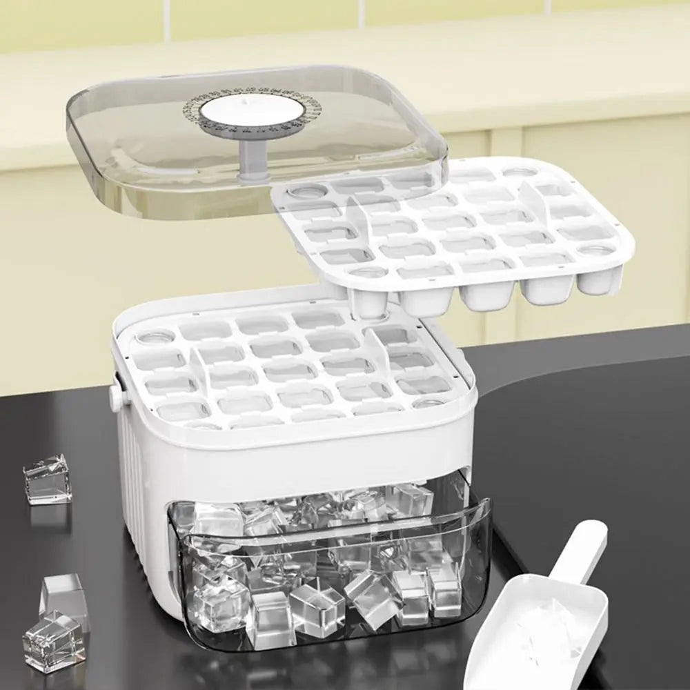 Ice cube tray with a container of ice cubes on a kitchen counter.