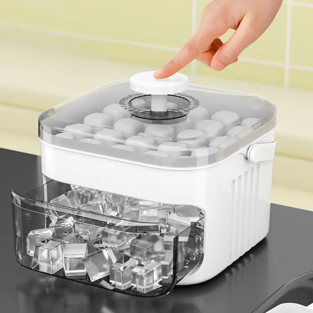 Ice cube maker with ice cubes on a kitchen counter